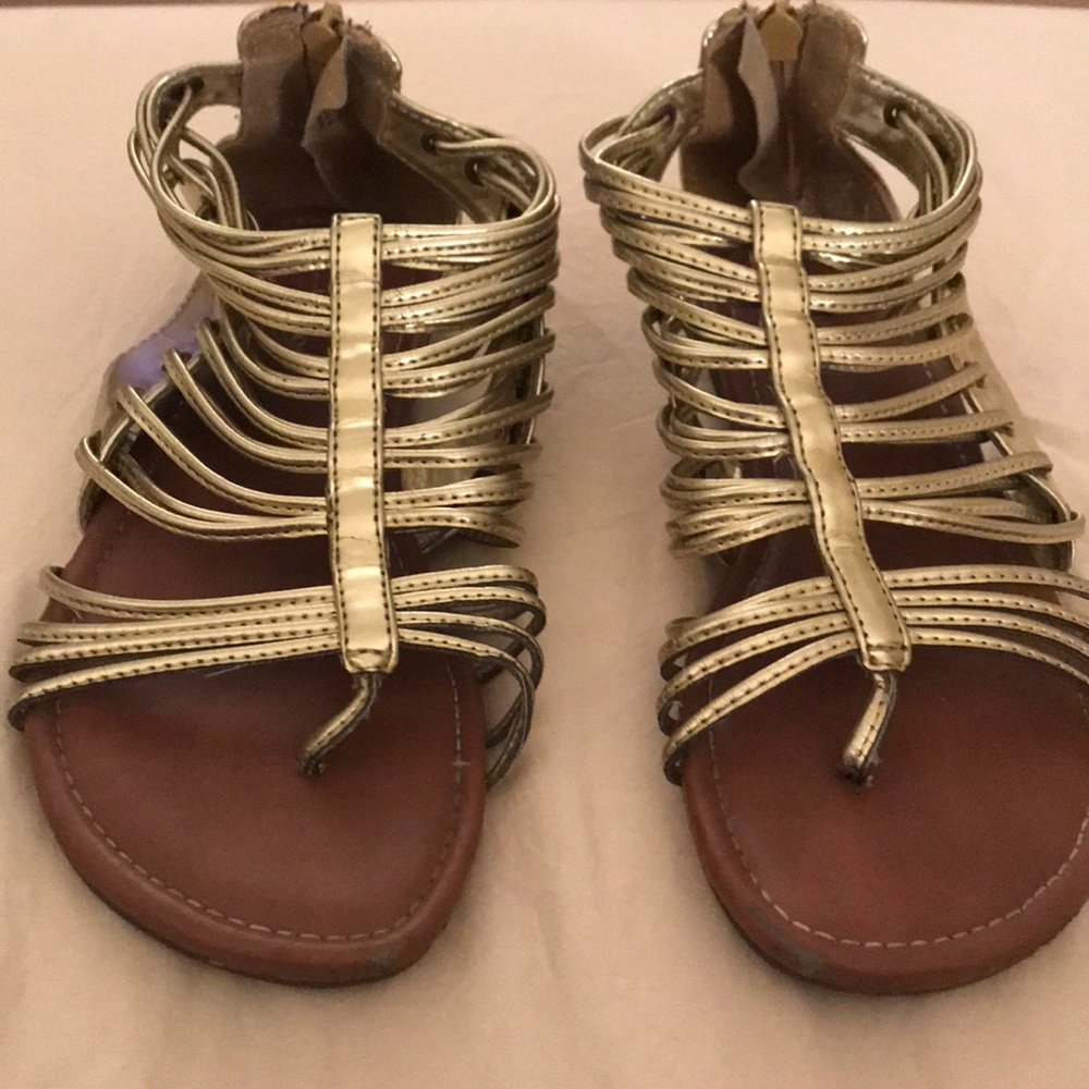 Gold size 4 xhilaration girls’ sandals.